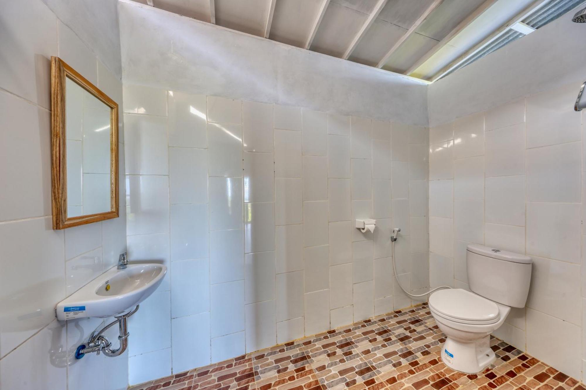 D Sebuluh Bungalow Batumadeg Rum bild