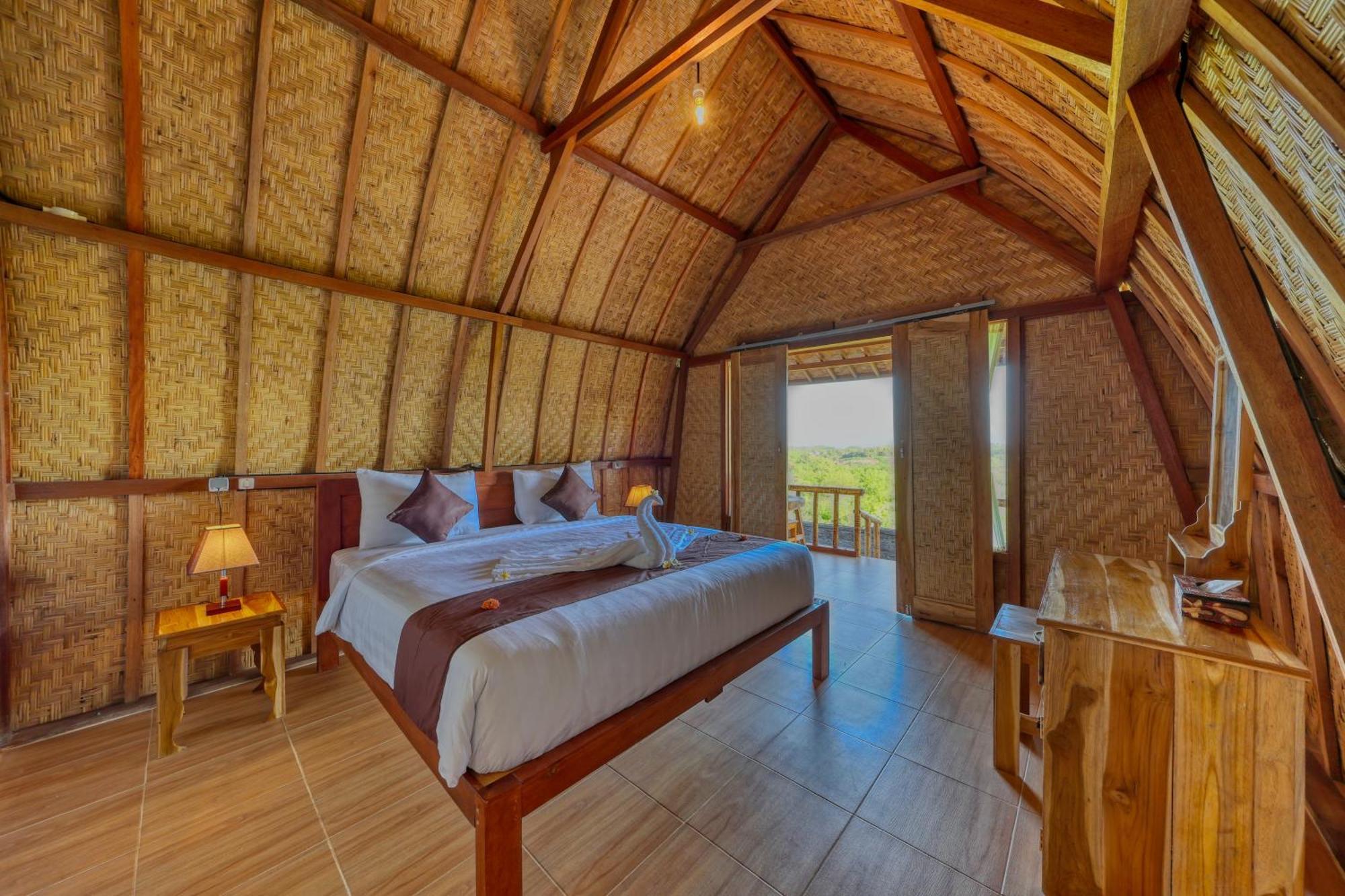 D Sebuluh Bungalow Batumadeg Rum bild