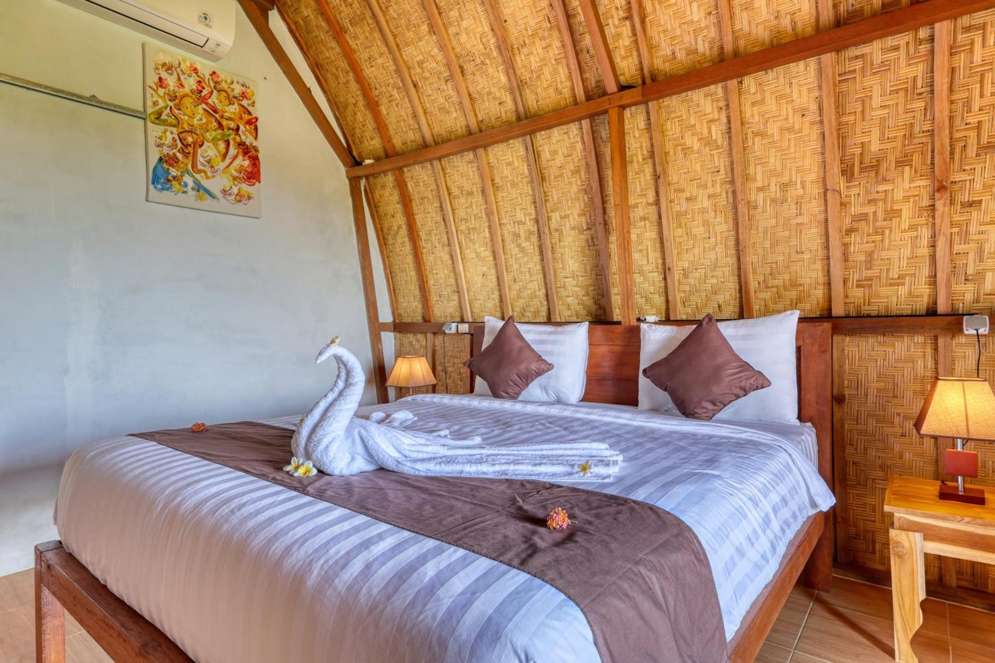 D Sebuluh Bungalow Batumadeg Rum bild