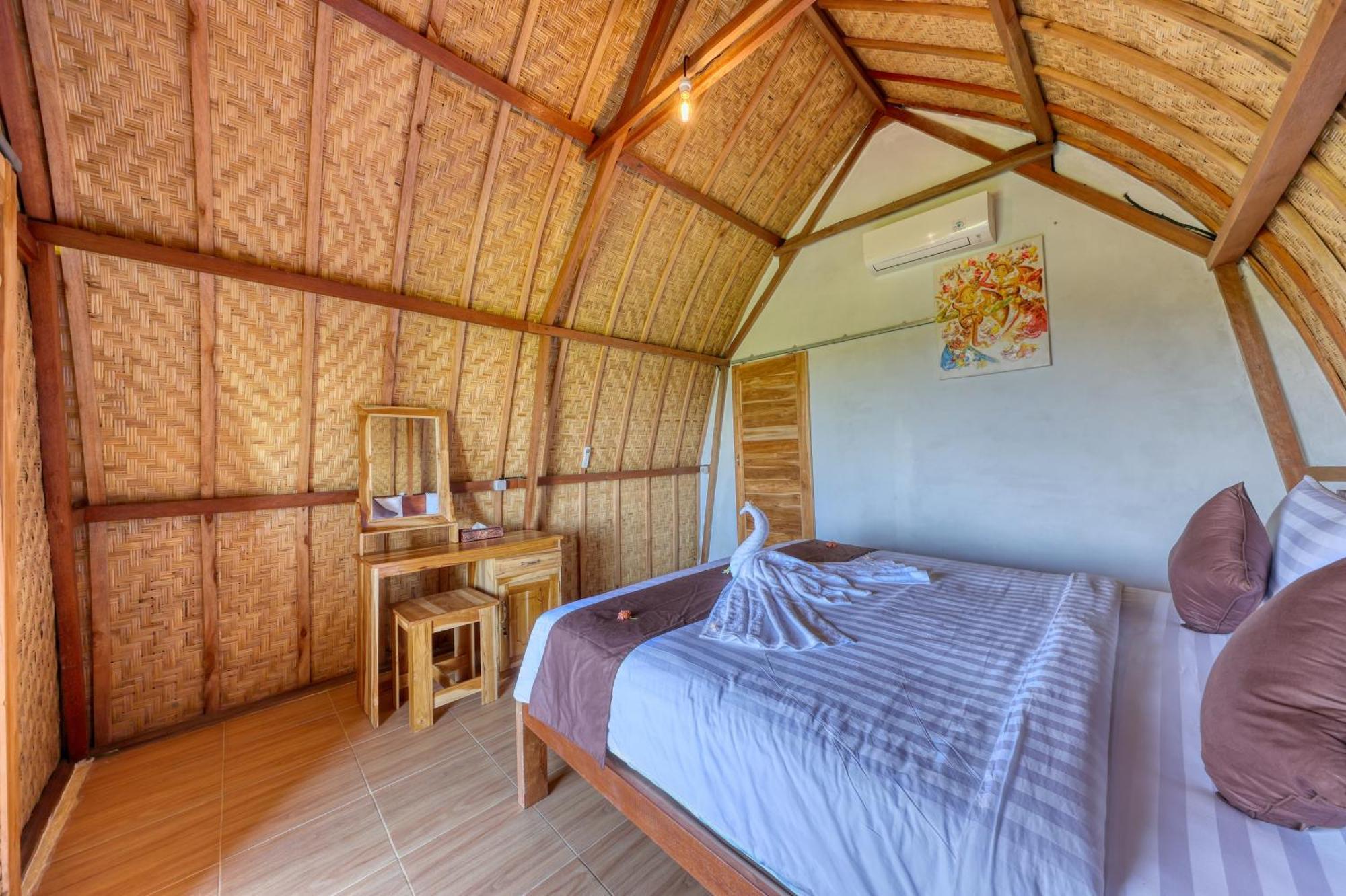 D Sebuluh Bungalow Batumadeg Rum bild