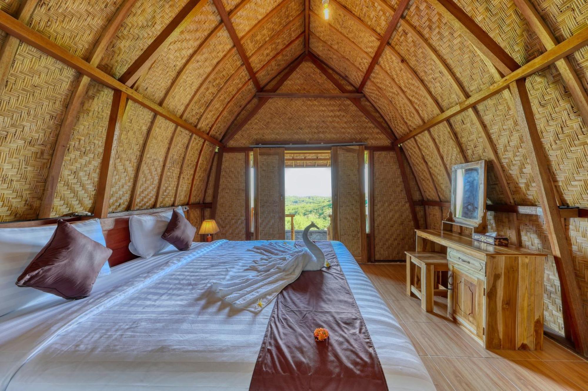 D Sebuluh Bungalow Batumadeg Rum bild