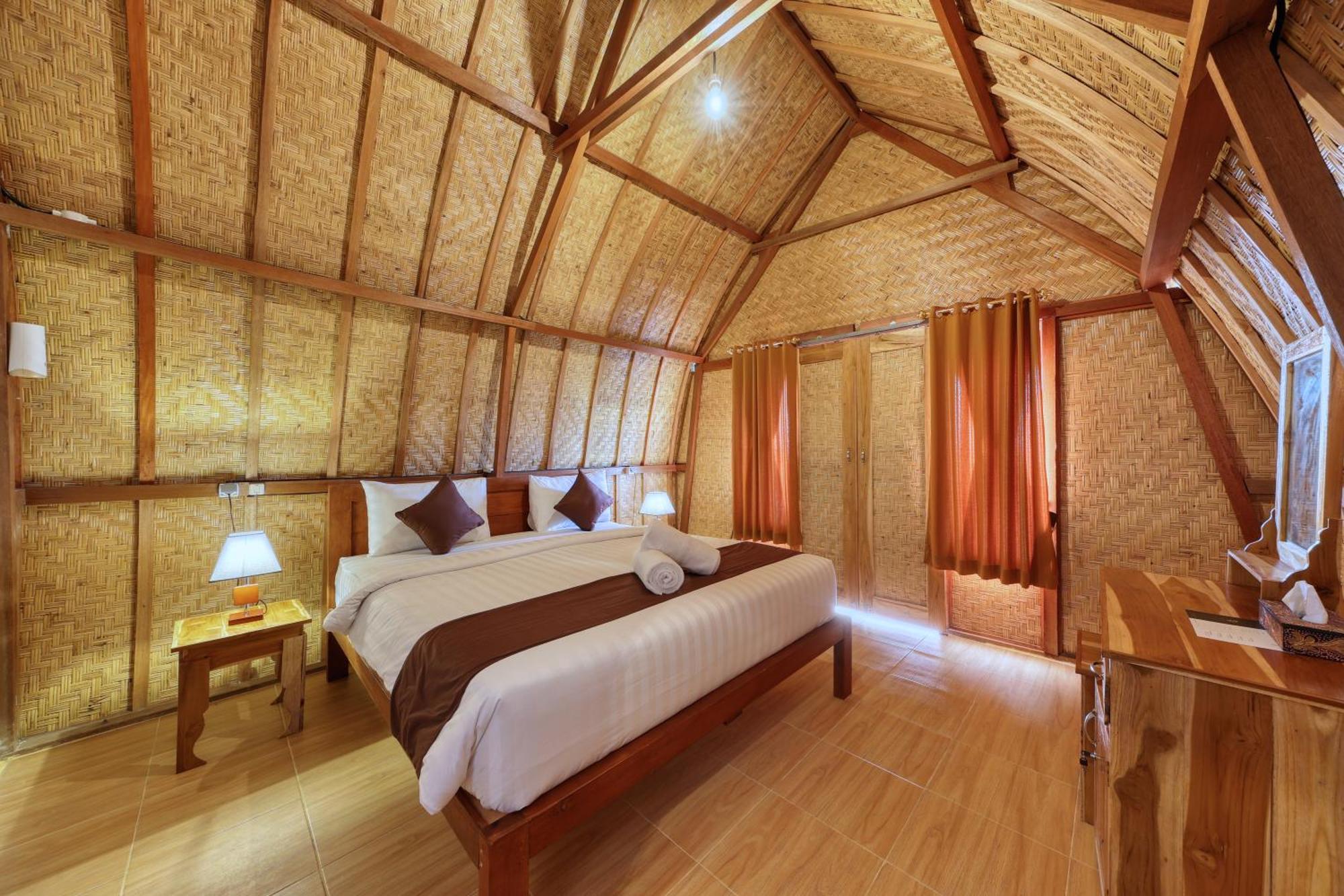 D Sebuluh Bungalow Batumadeg Rum bild