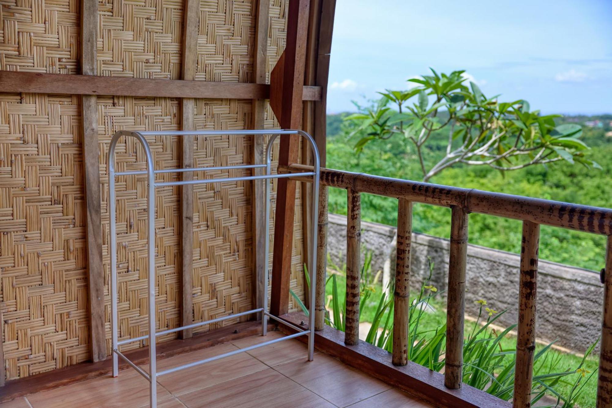 D Sebuluh Bungalow Batumadeg Rum bild